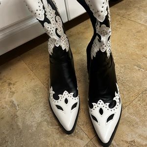 Women’s cowgirl boots; black and white with silver stud detail